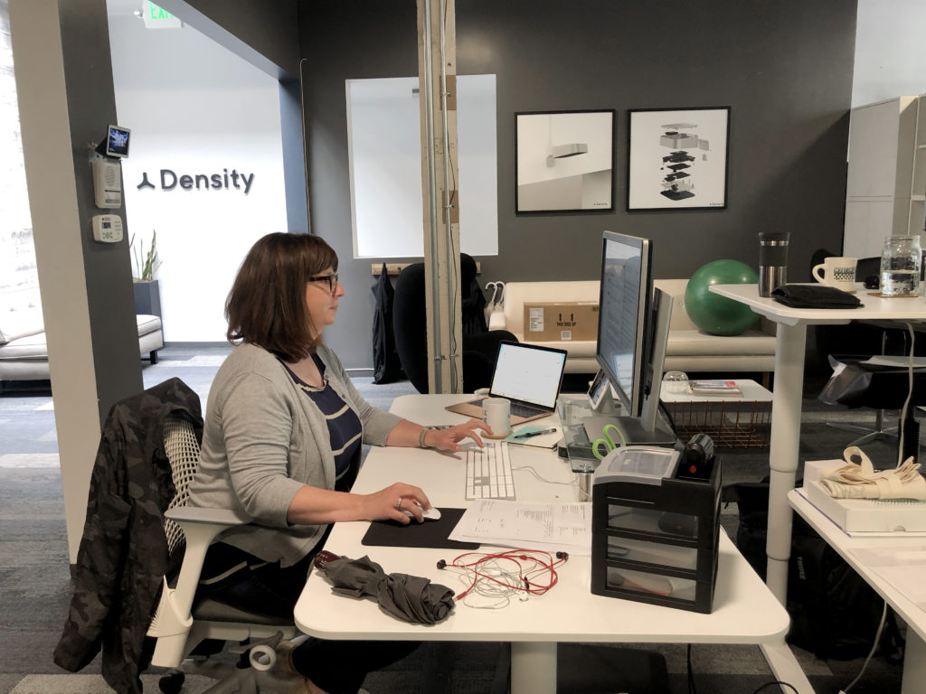 Image of Density employee using an assigned desk
